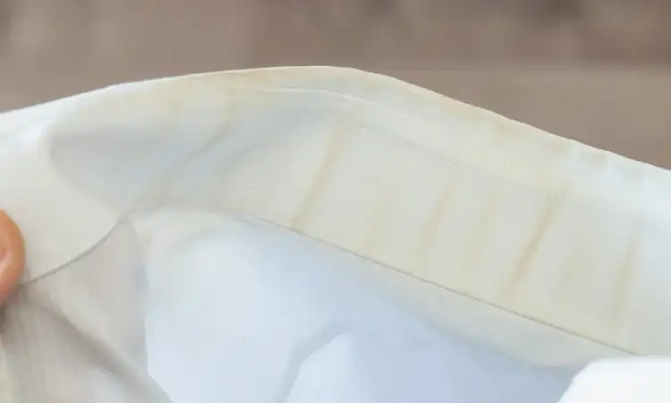 Penyebab noda kuning di kemeja putih, Sumber: heritageparklaundry.com